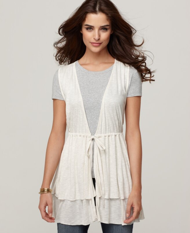 woman in white vest