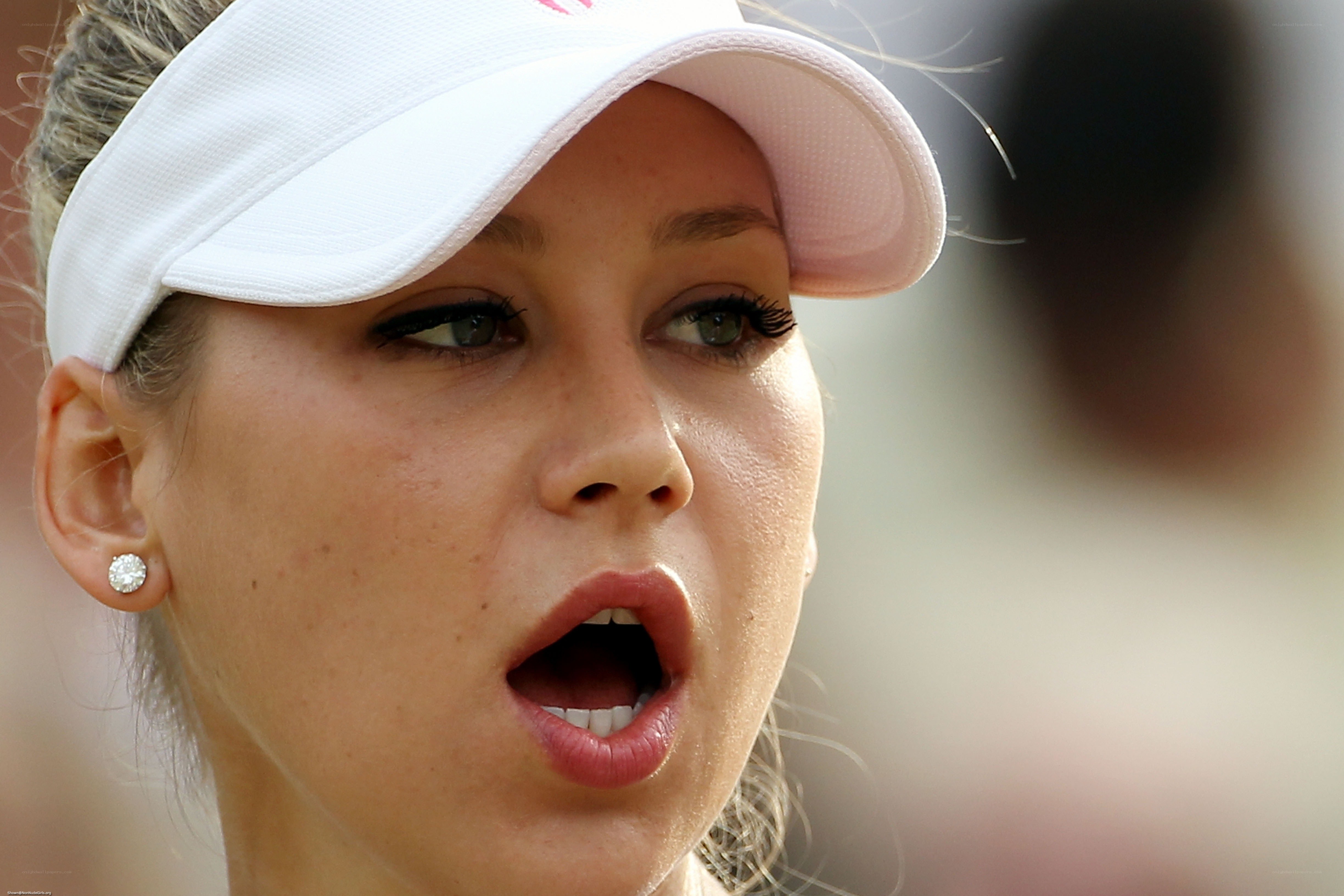 woman in white visor