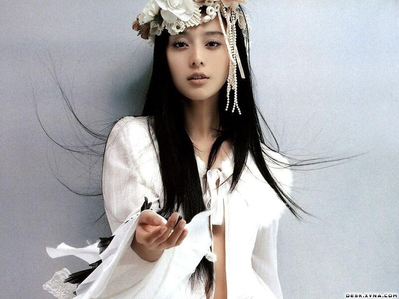 woman in white with floral crown