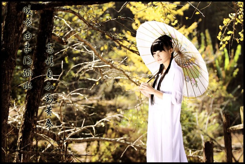 Woman in white with parasol