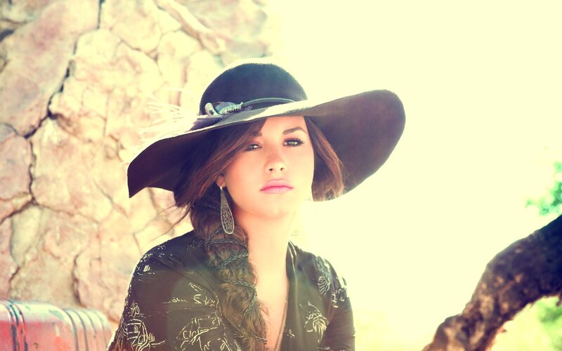woman in wide-brimmed hat