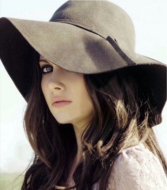 woman in wide-brimmed hat