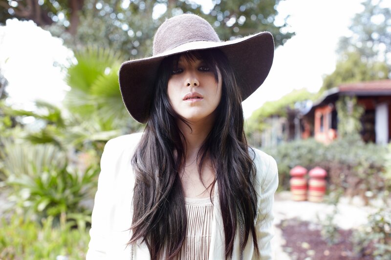 woman in wide-brimmed hat