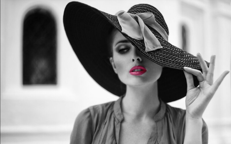 woman in wide-brimmed hat