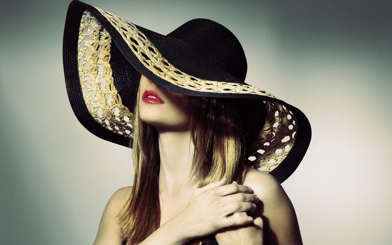 woman in wide-brimmed hat