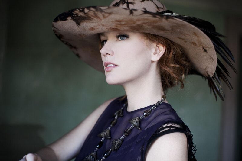 woman in wide-brimmed hat