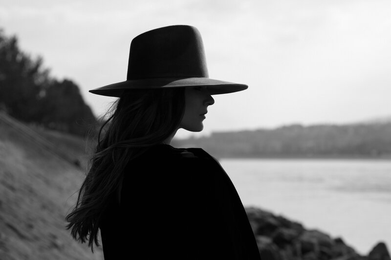 Woman in Wide-brimmed Hat — Black, Contemplative