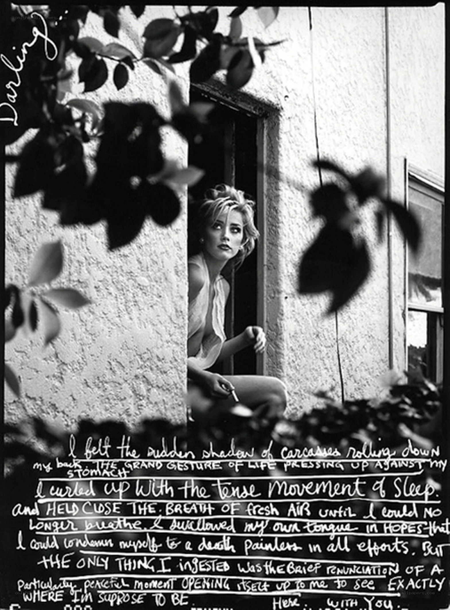 woman in window with text