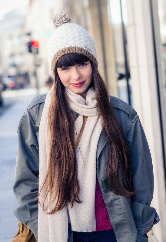 woman in winter clothes on street