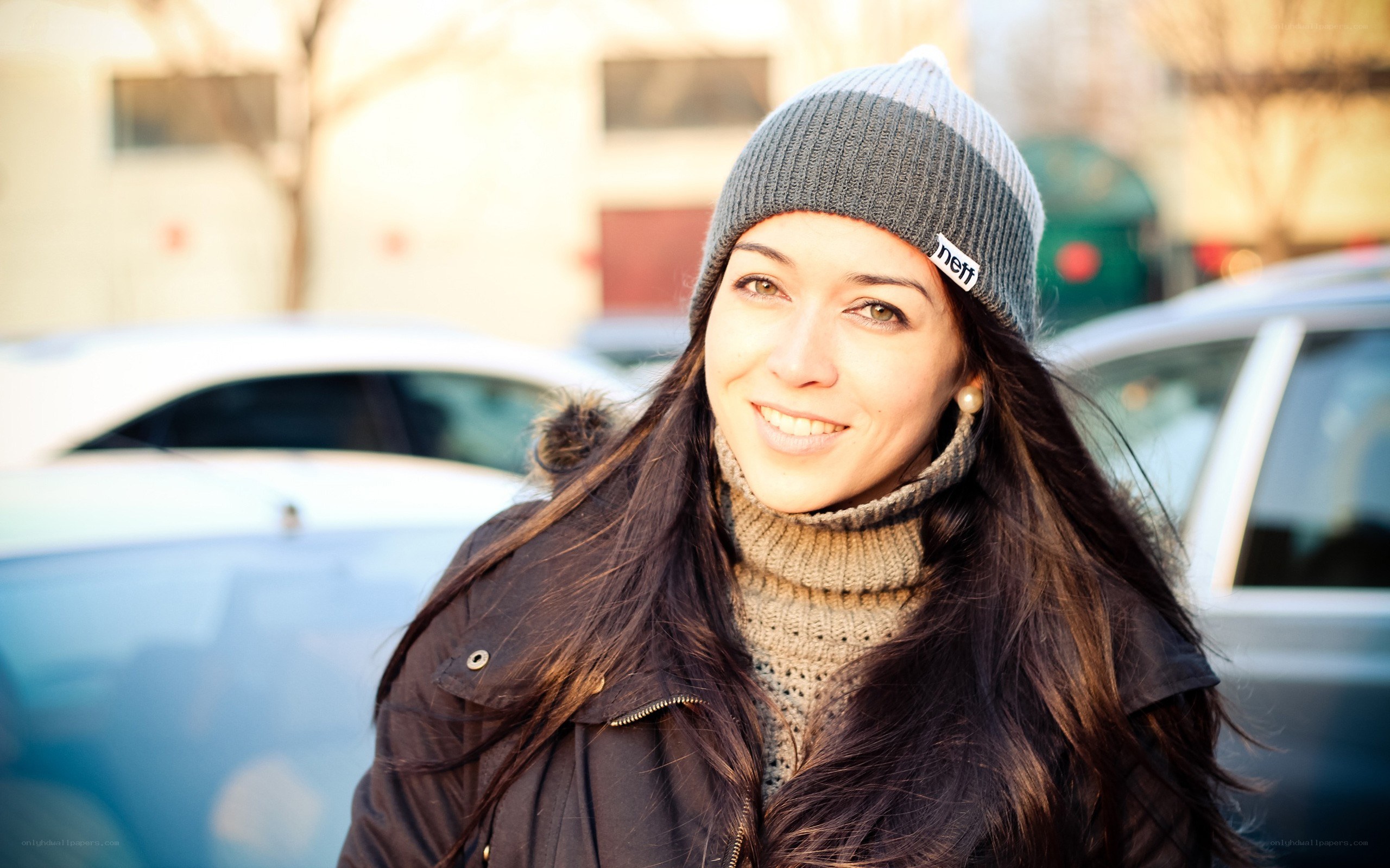 woman in winter clothes smiling