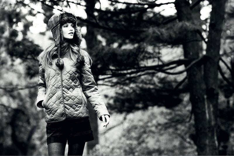 woman in winter coat and hat