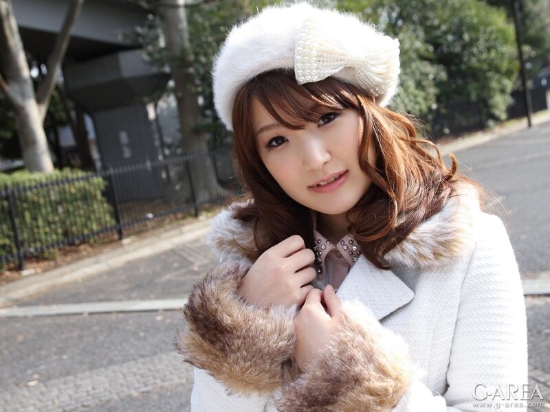 woman in winter coat and hat