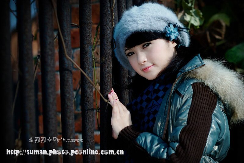 woman in winter coat and hat