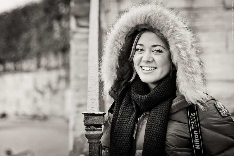 woman in winter coat smiling