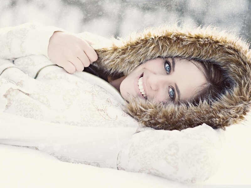 woman in winter coat smiling