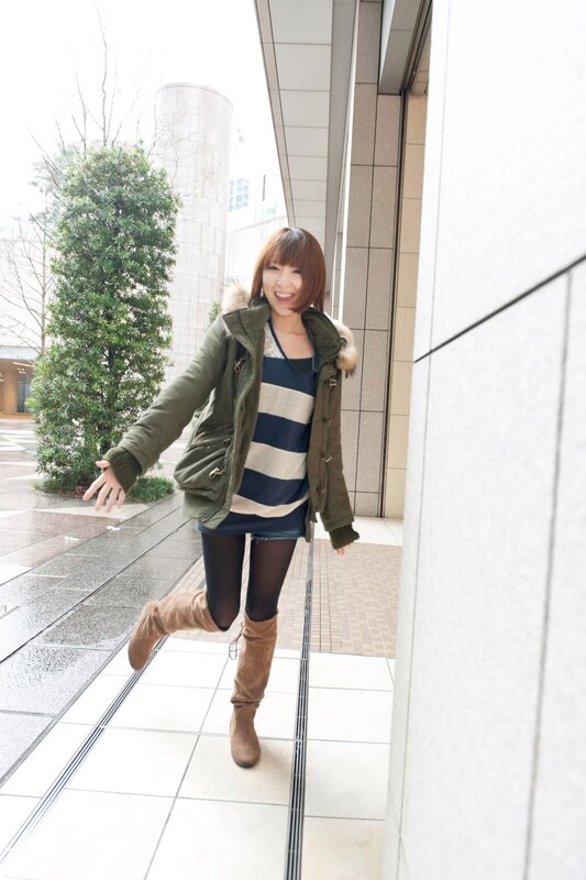 woman in winter coat smiling