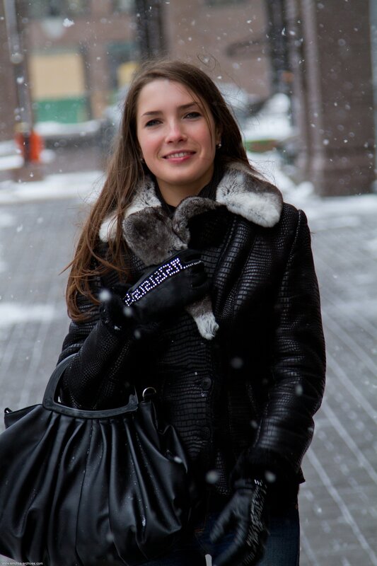 Woman in winter coat smiling
