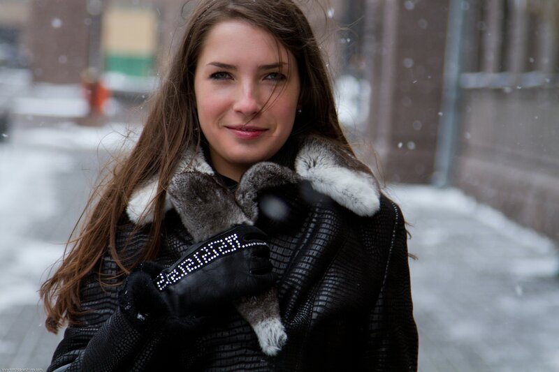 woman in winter coat smiling