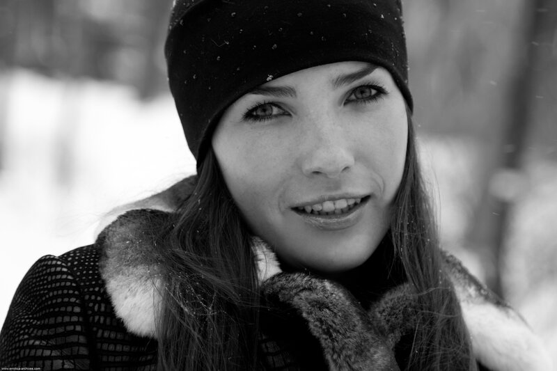 woman in winter coat smiling