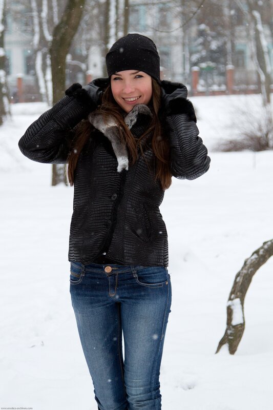 woman in winter coat smiling