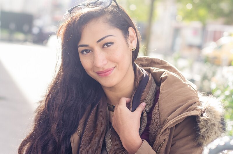 woman in winter coat smiling