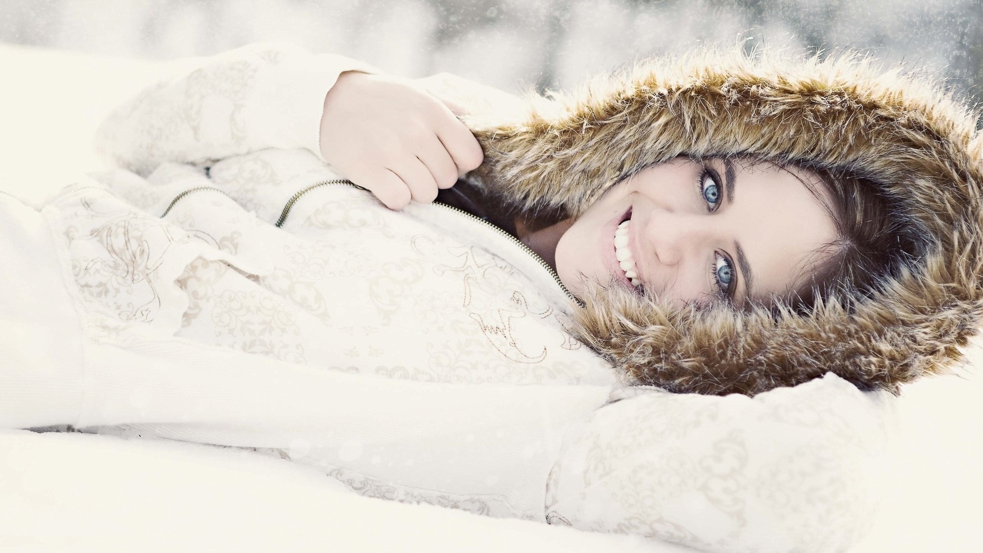 woman in winter coat smiling