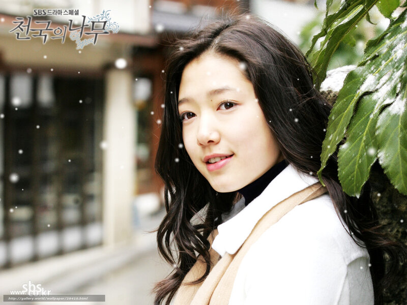woman in winter coat smiling
