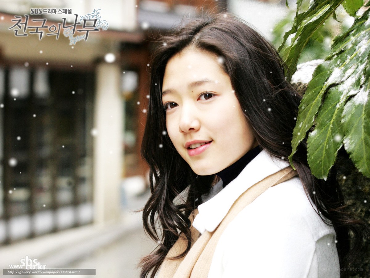 woman in winter coat smiling