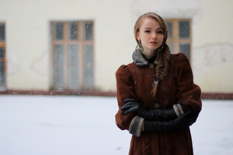 woman in winter coat standing outside