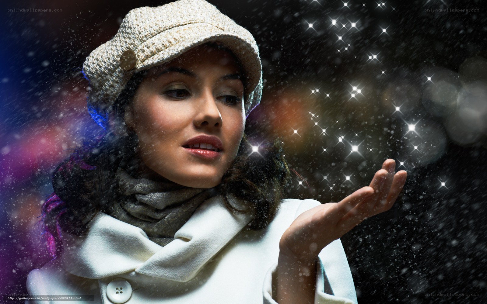woman in winter coat with snow