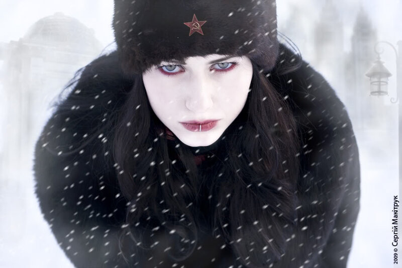 woman in winter coat with star