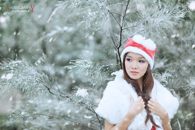 Woman in winter forest