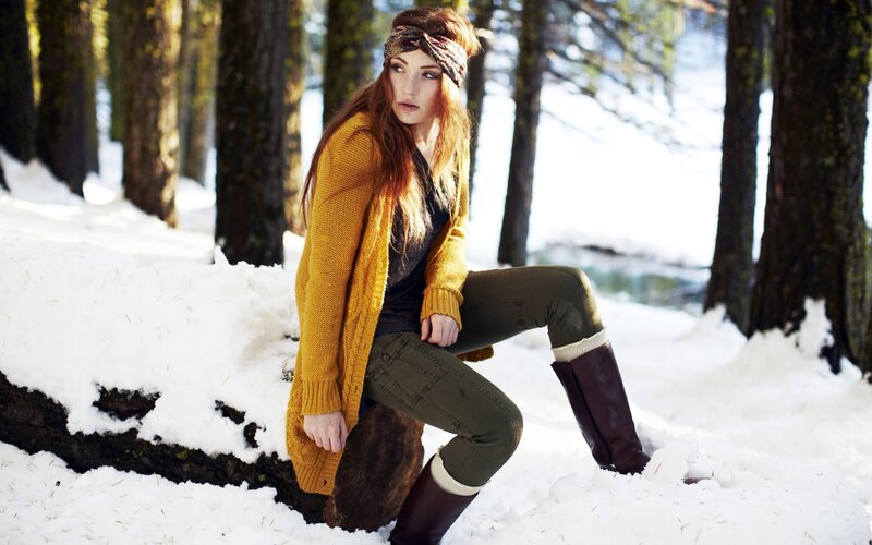 Woman in winter forest
