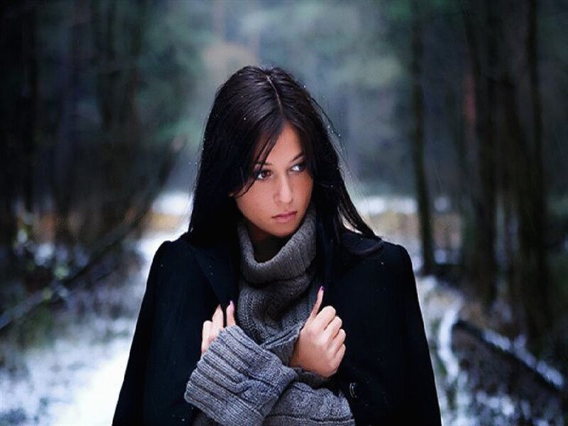 woman in winter forest