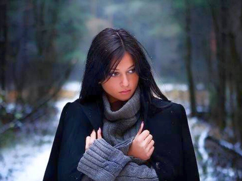 woman in winter forest