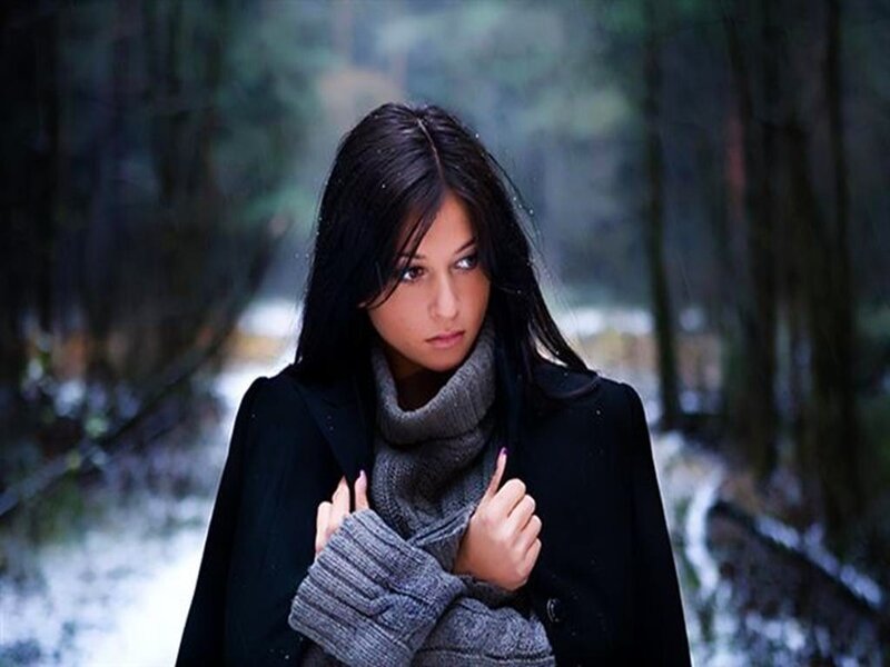 woman in winter forest