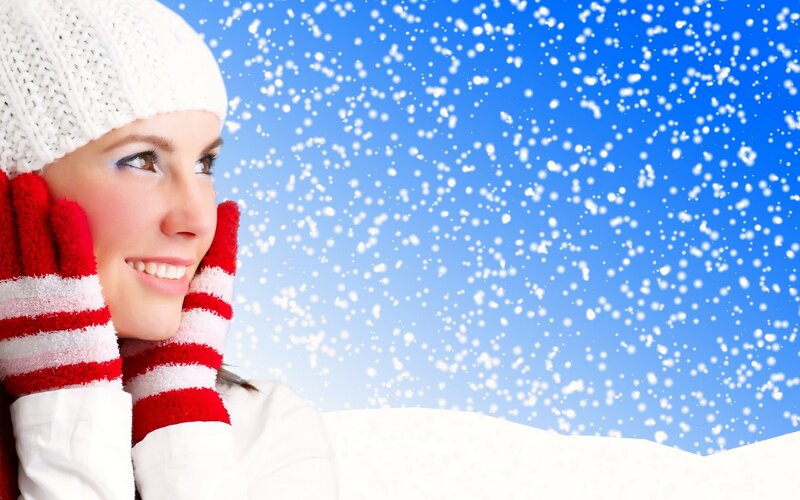 woman in winter gear smiling