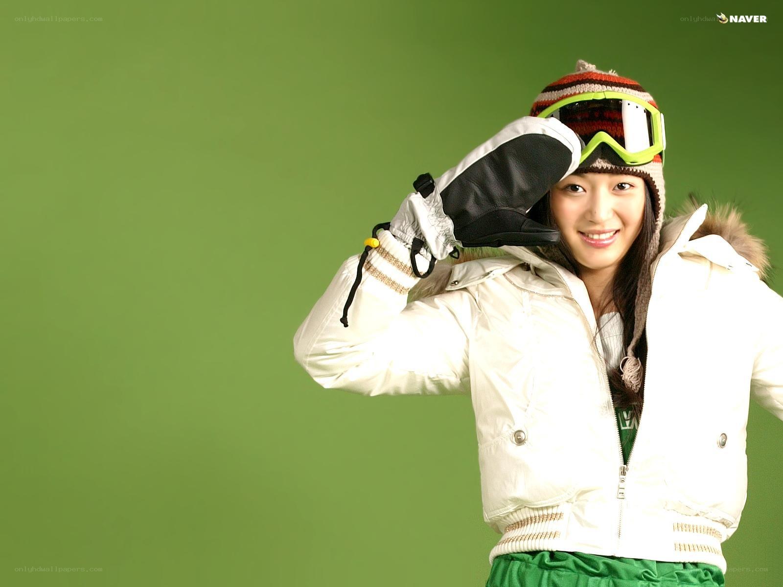 woman in winter gear smiling