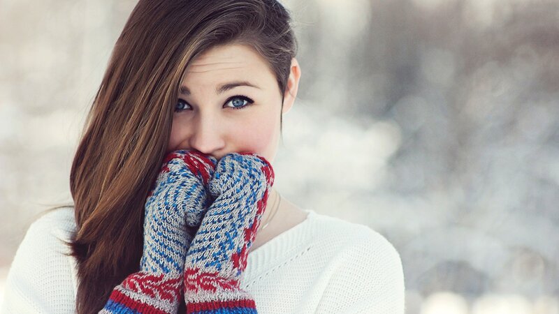 woman in winter gloves