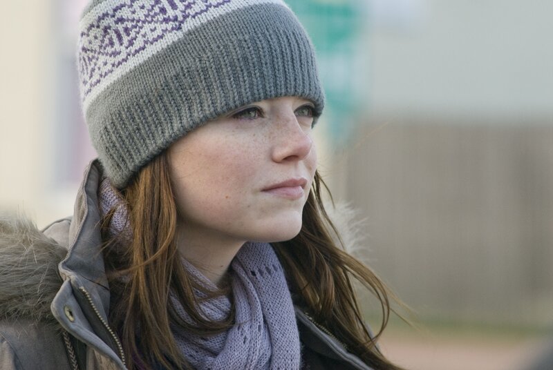 woman in winter hat and scarf