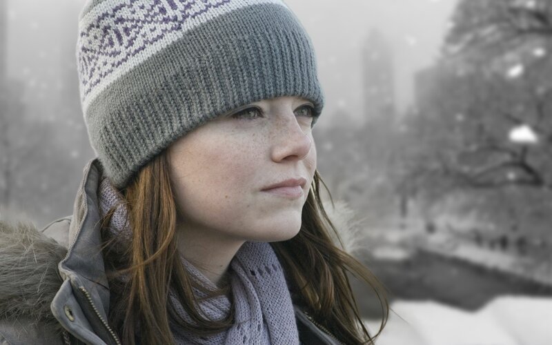 woman in winter hat and scarf