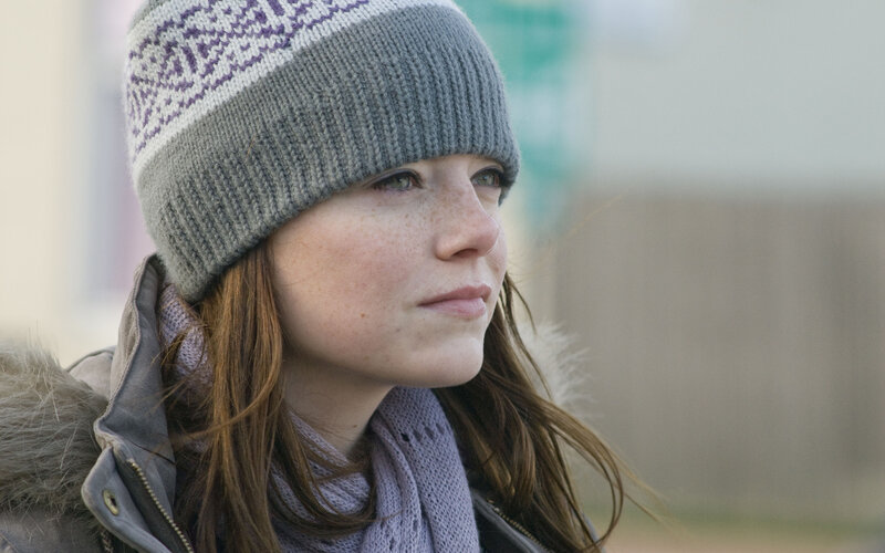 woman in winter hat and scarf