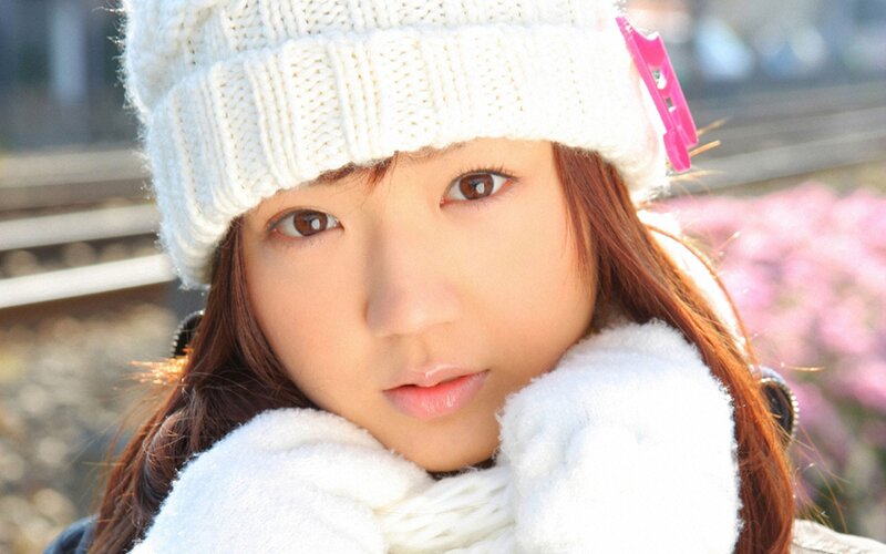 woman in winter hat and scarf