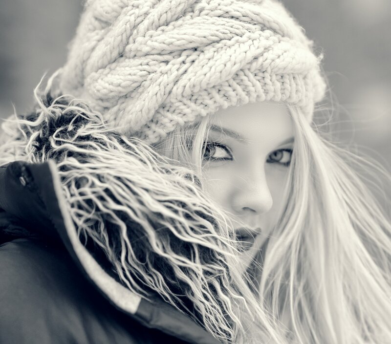 Woman in Winter Hat — Black, Dramatic, Photograph