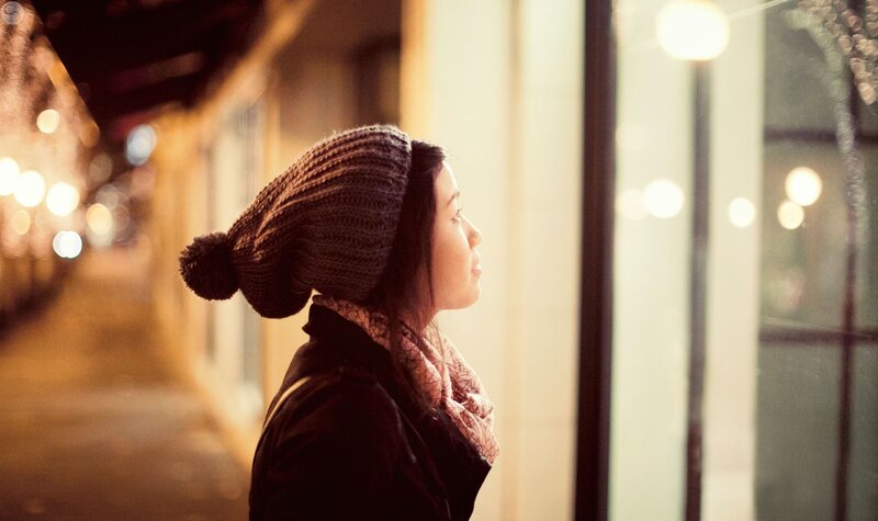 woman in winter hat on street