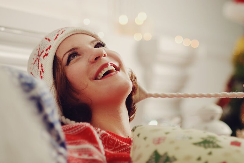 woman in winter hat smiling