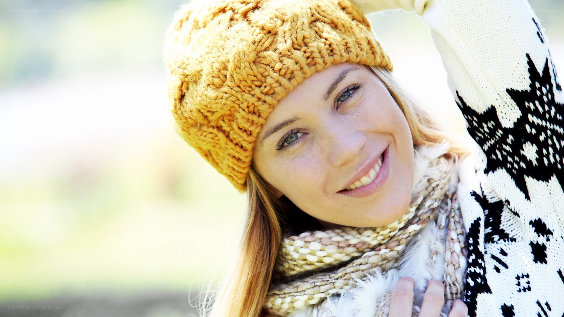 woman in winter hat smiling