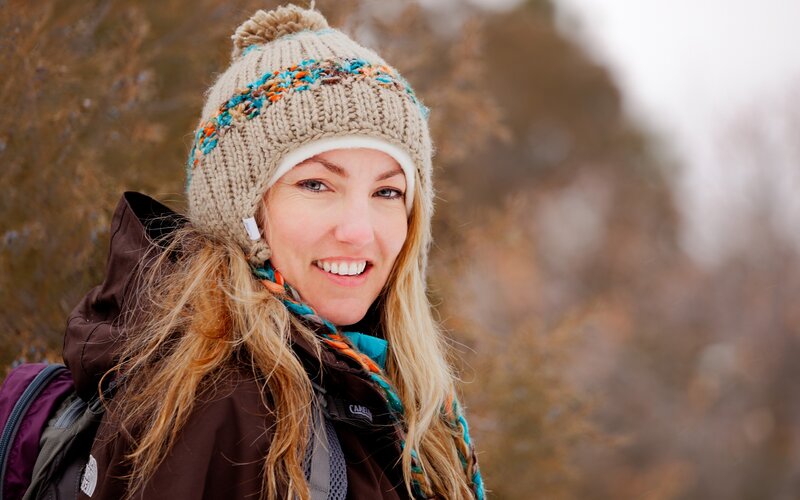 woman in winter hat smiling