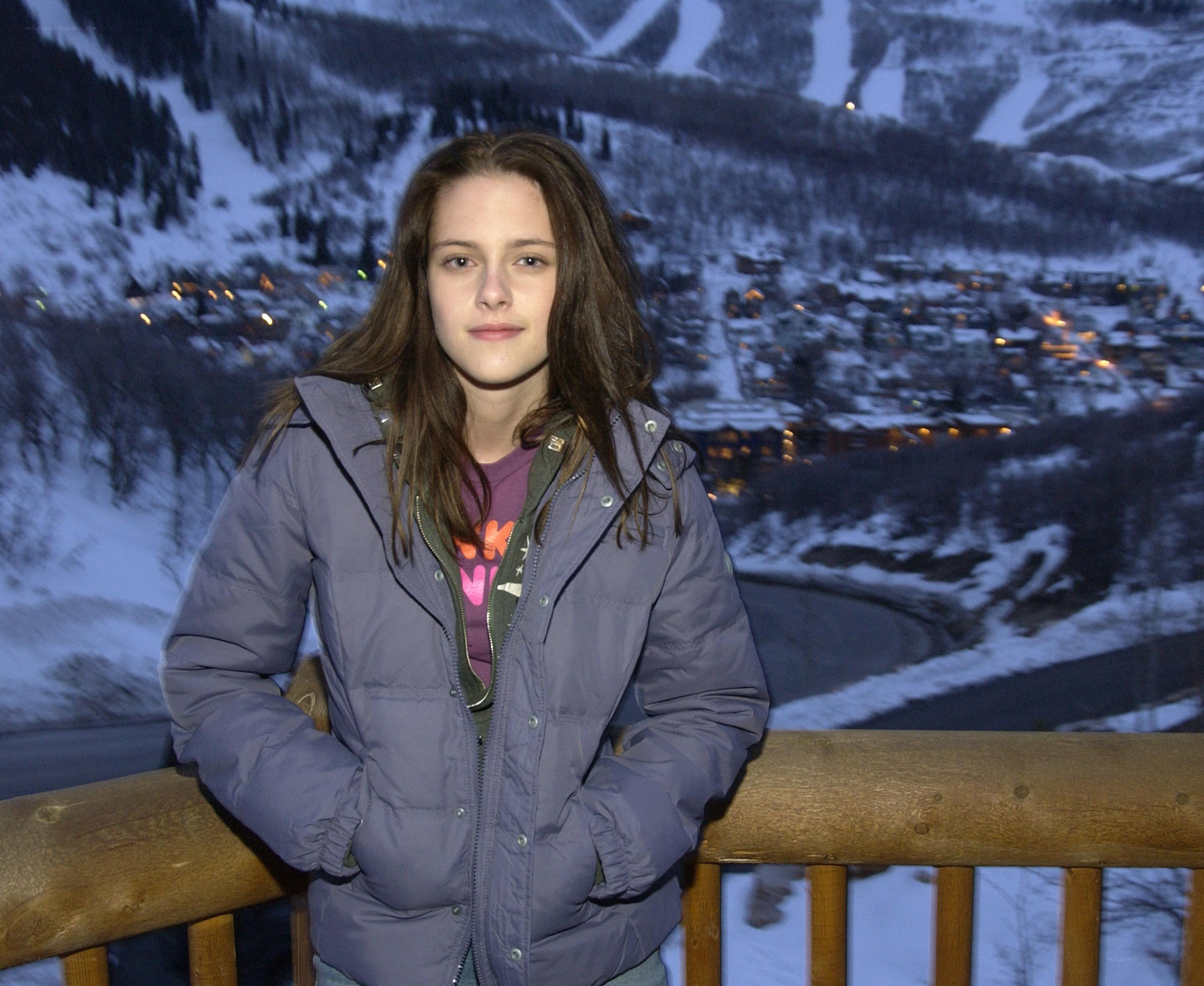 woman in winter jacket at night
