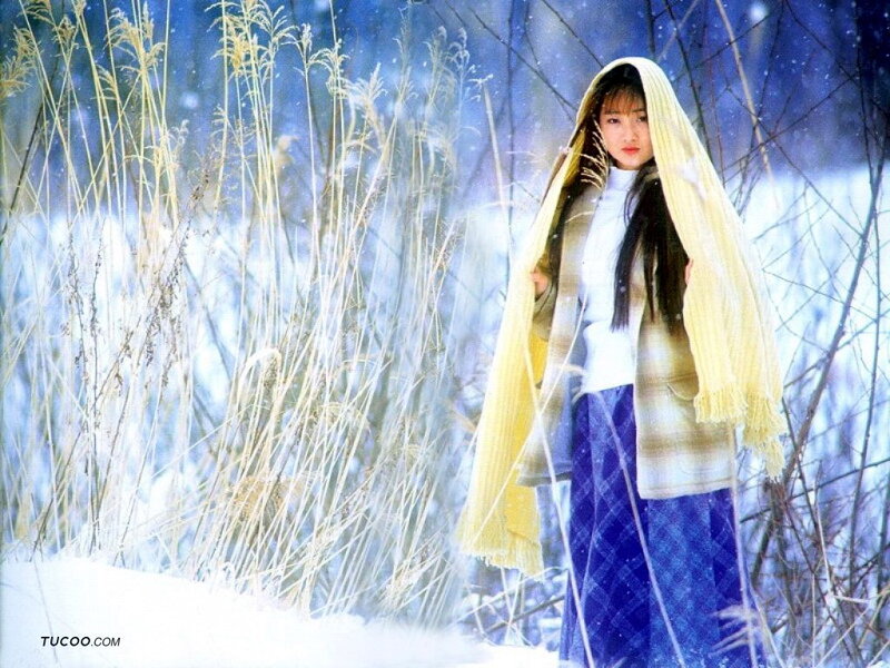 Woman in winter landscape